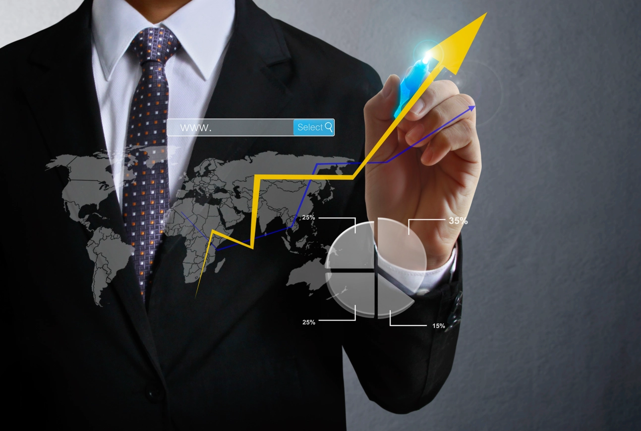 Businessman drawing upward trending graph.