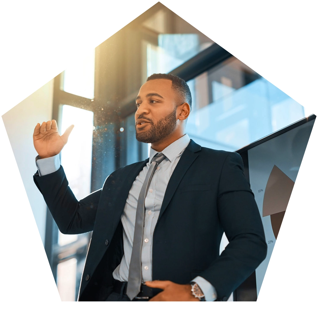 Businessman presenting in a modern office setting.
